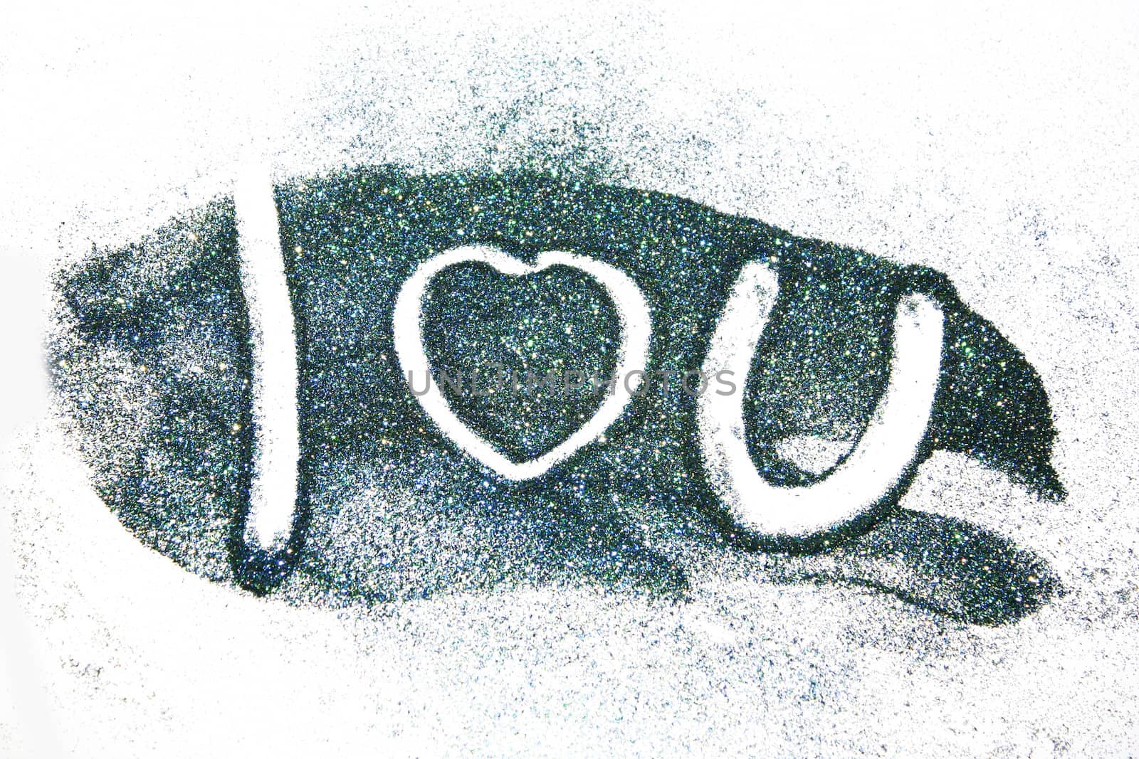 The word love you written on colored glitter powder