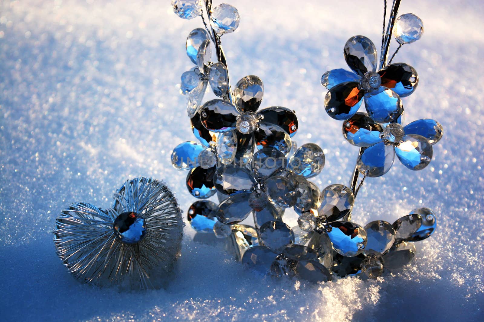 two crystal trees branches in the snow in a winter day with crystal heart by valentinacarpin