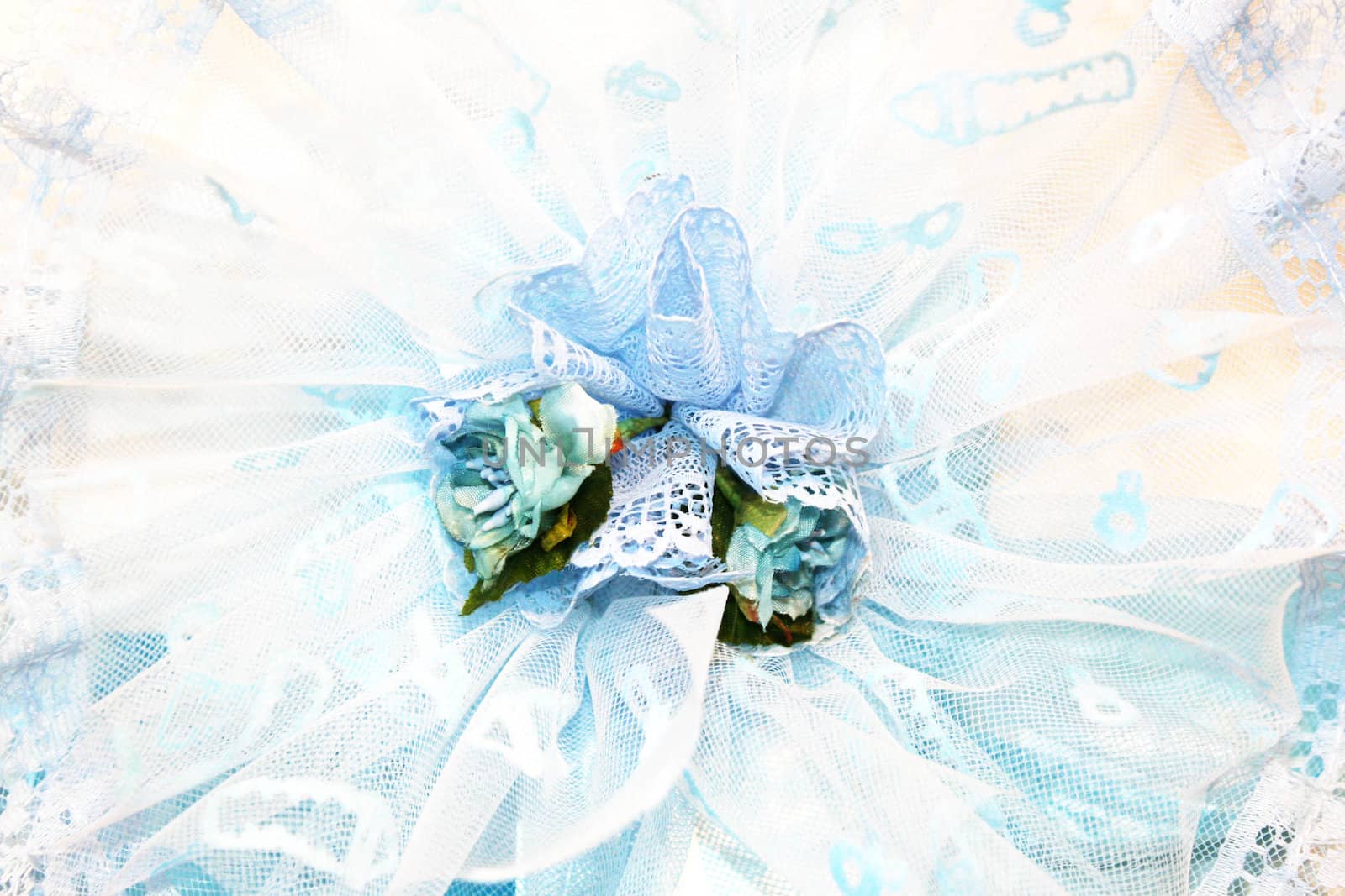 Blue ribbon celebrating a male newborn baby by valentinacarpin