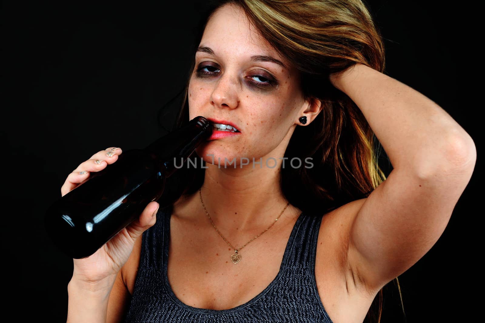 Beautiful young woman completely drunk or alcoholic