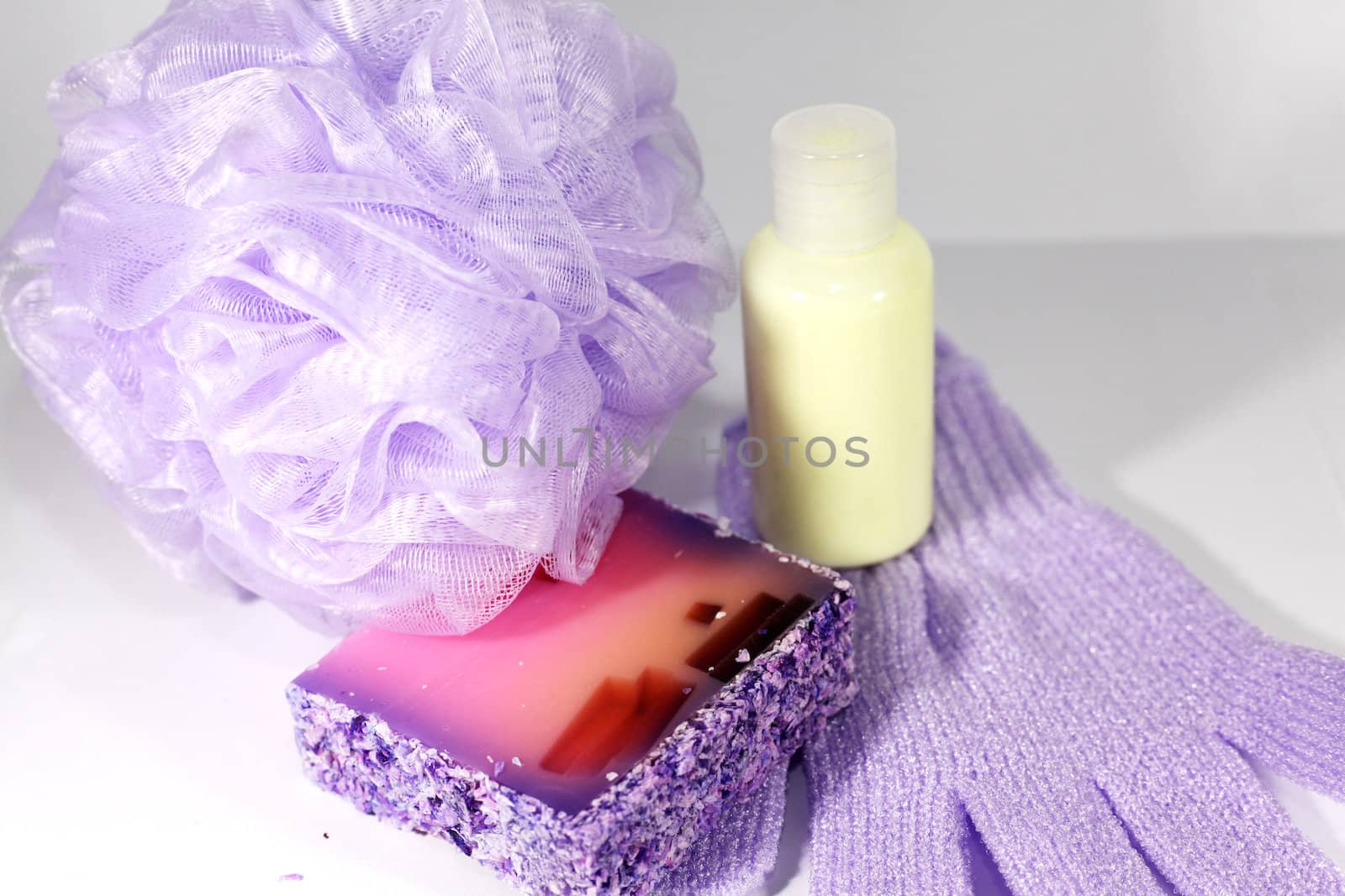 composition of sponge to wash,colored soaps and shampoo  bottle  by valentinacarpin