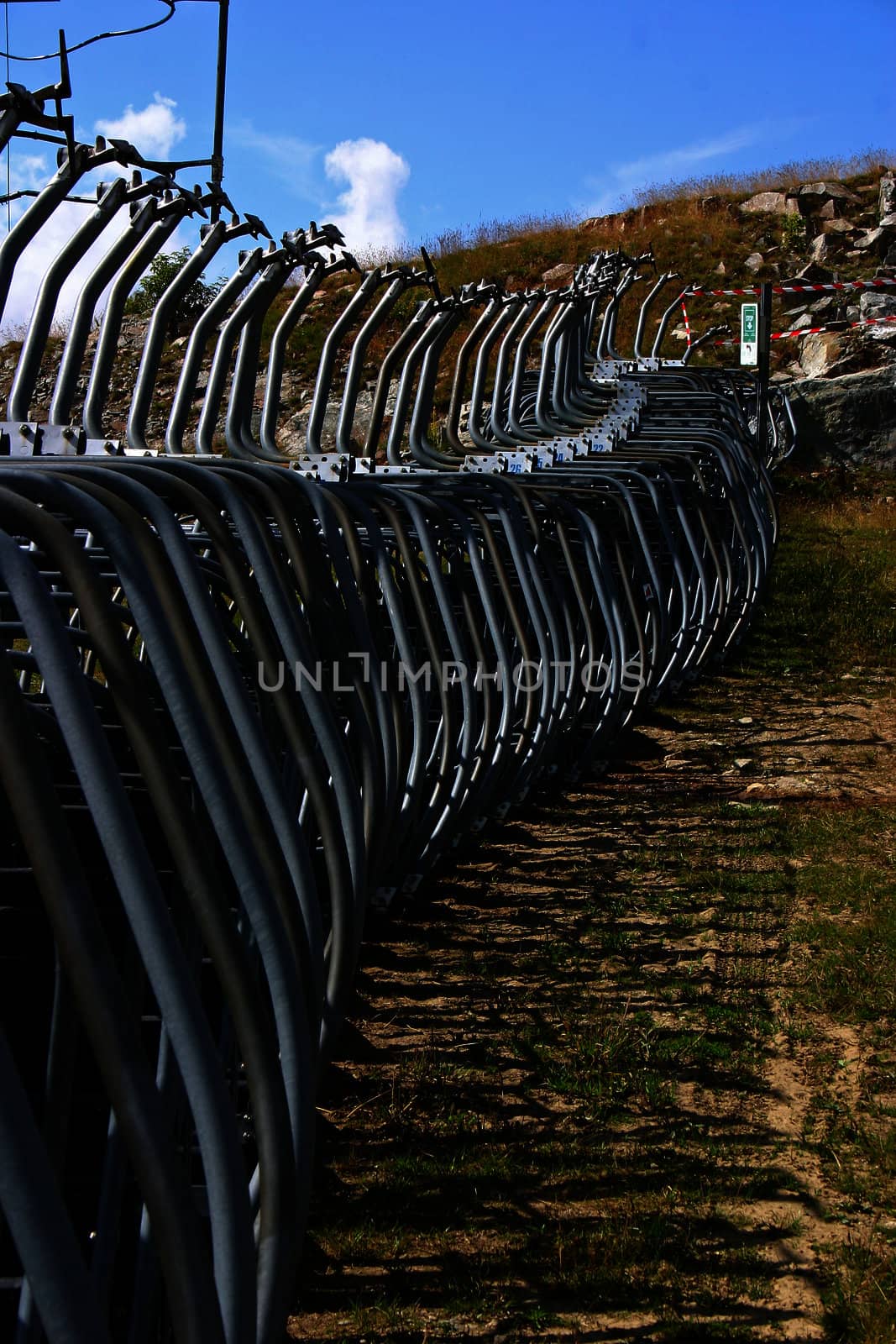 Empty ski seats in the mountains during summer