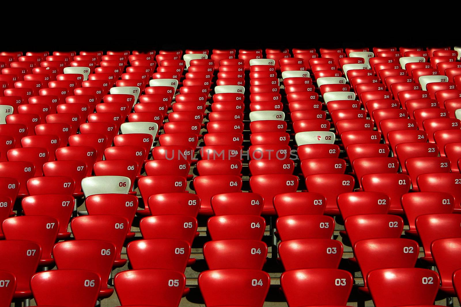 Overview of Red Tribune Seats in an Olympic Stadium