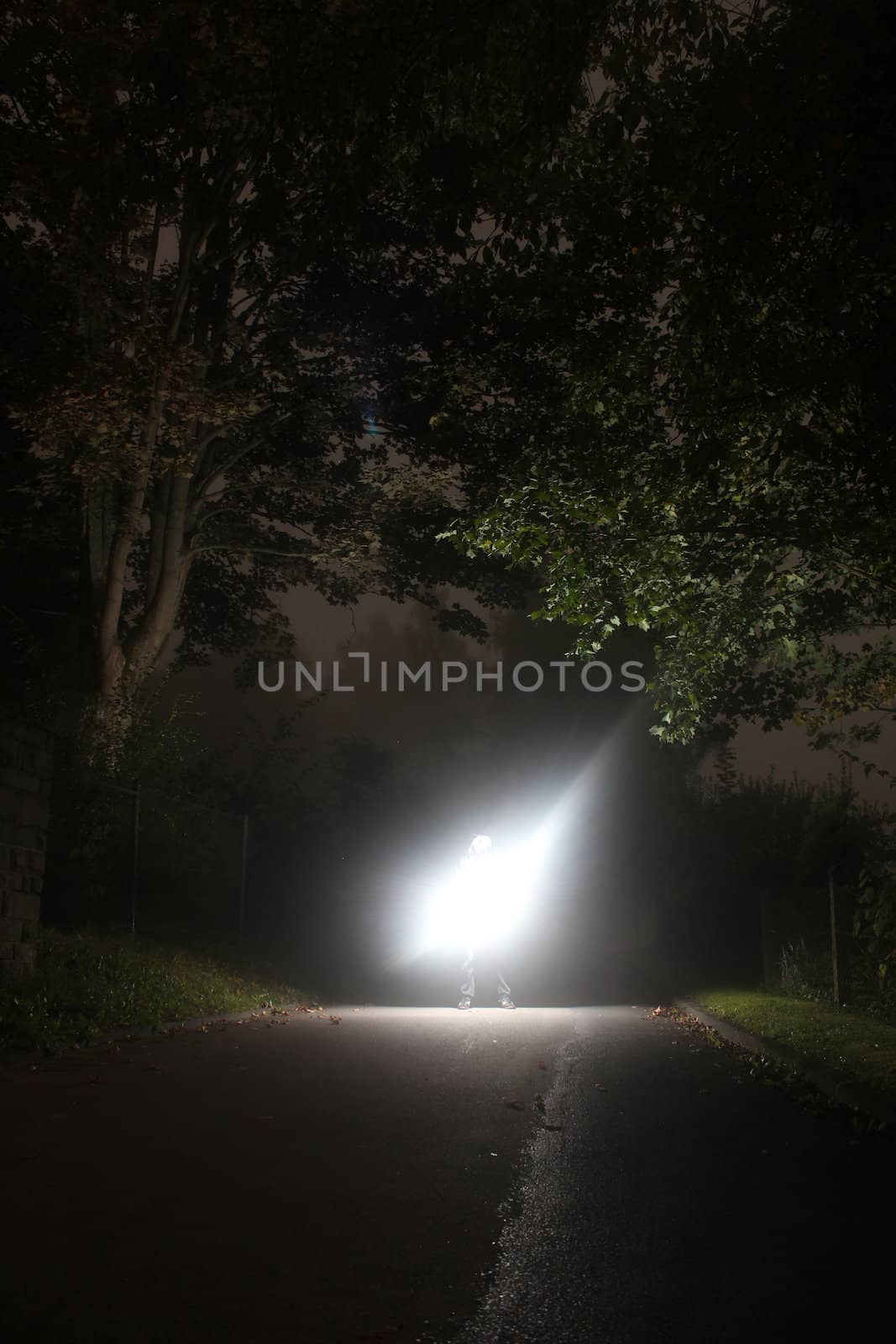 guy at night with mobile strobe unit by Teka77