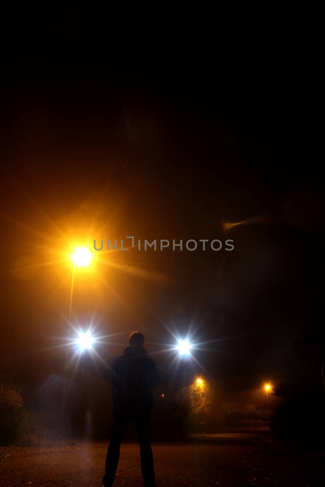 guy at night with mobile strobe units