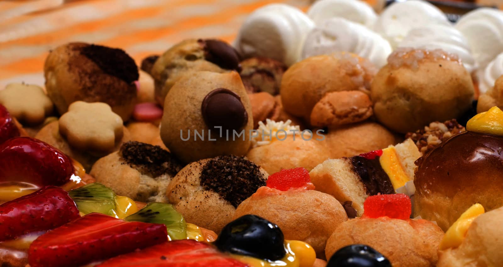 Delicious, handmade dessert: tarts, pastries, cakes with fruit, cream, icing