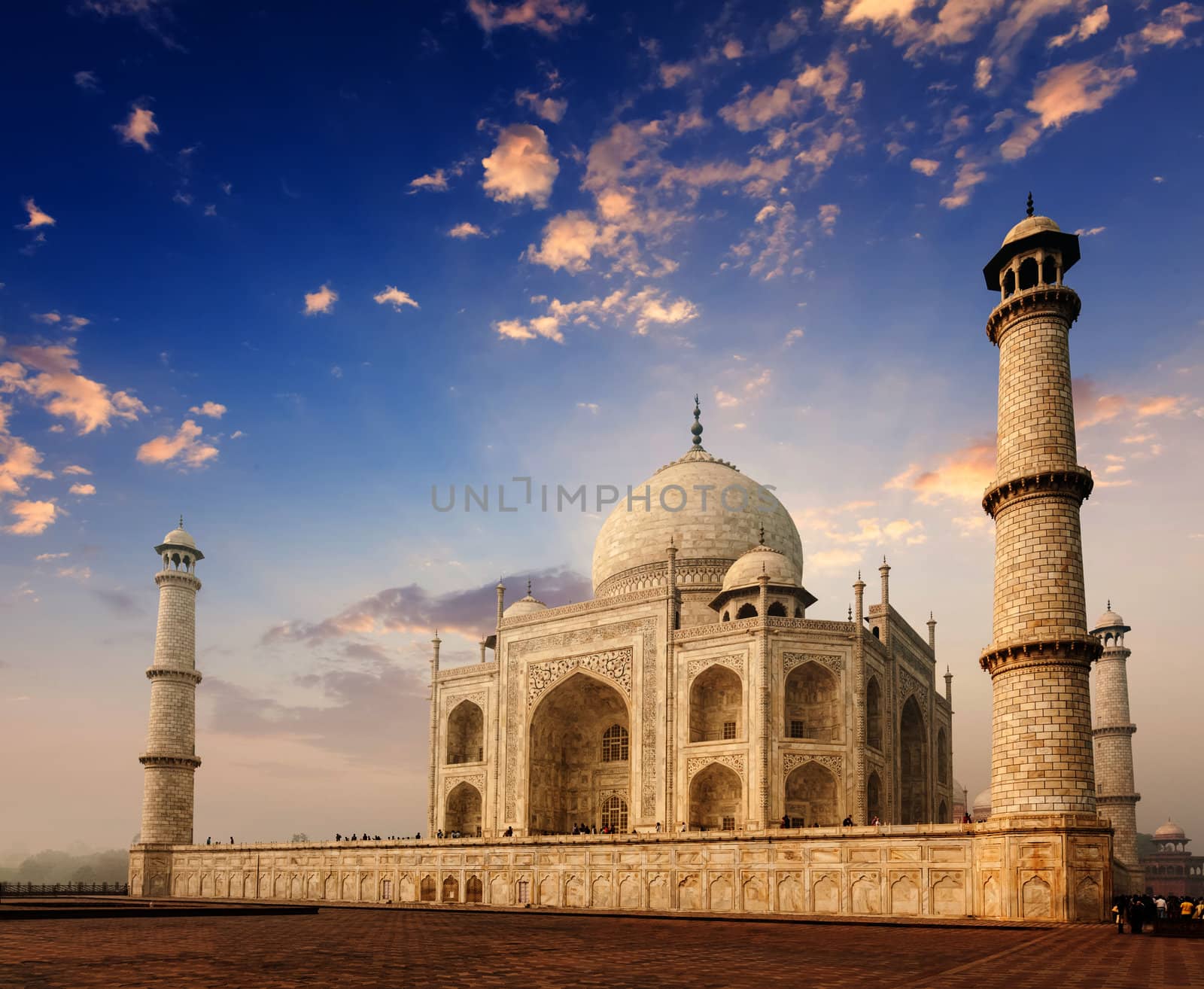 Taj Mahal on sunrise. Indian Symbol - India travel background. Agra, India