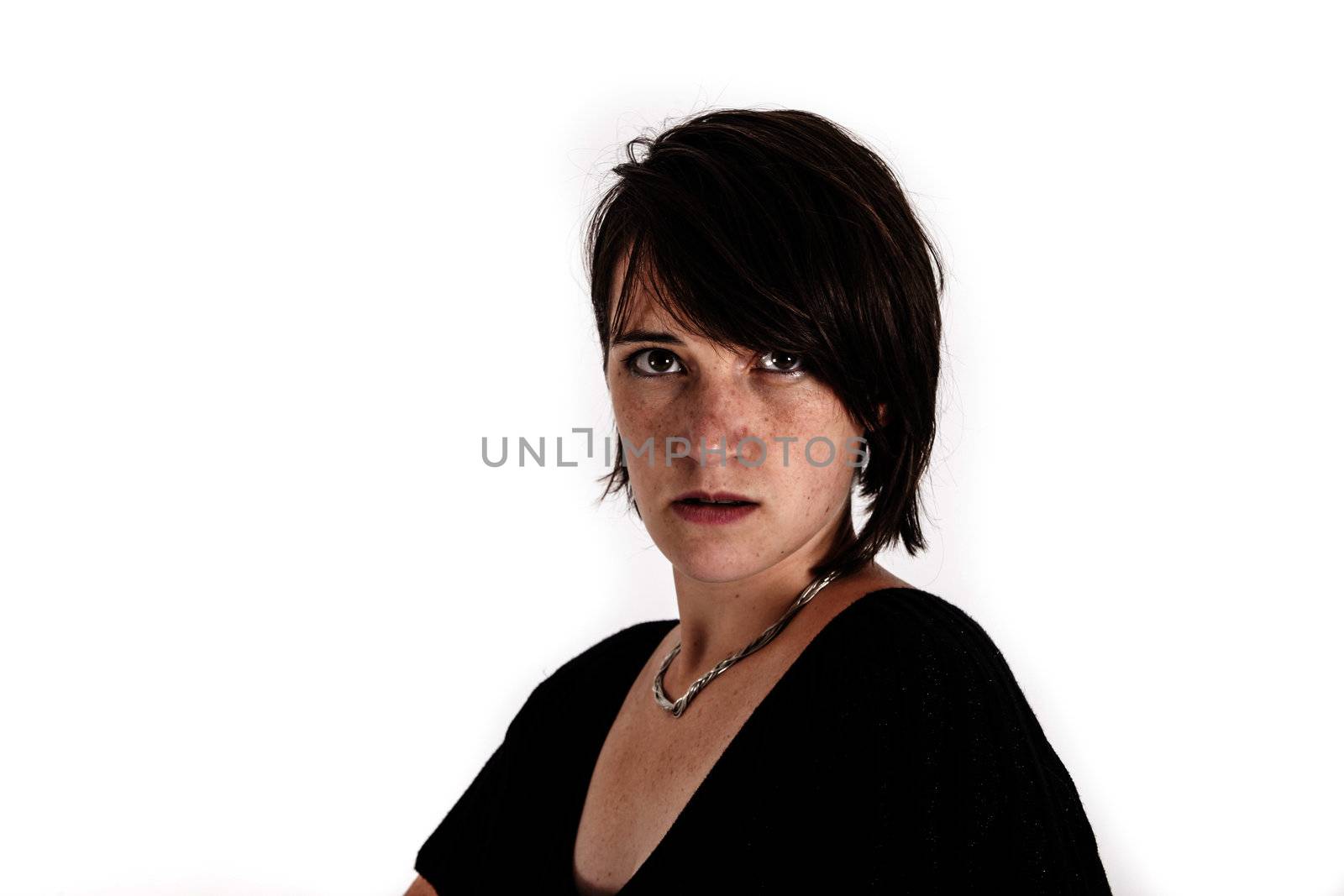 variation of expression on the face of a young brunette woman in studio with a colored scarf