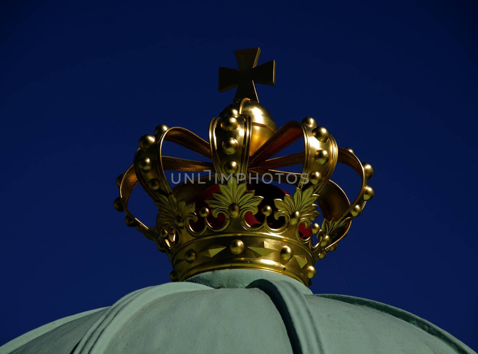 Gold Danish crown with blue sky behind