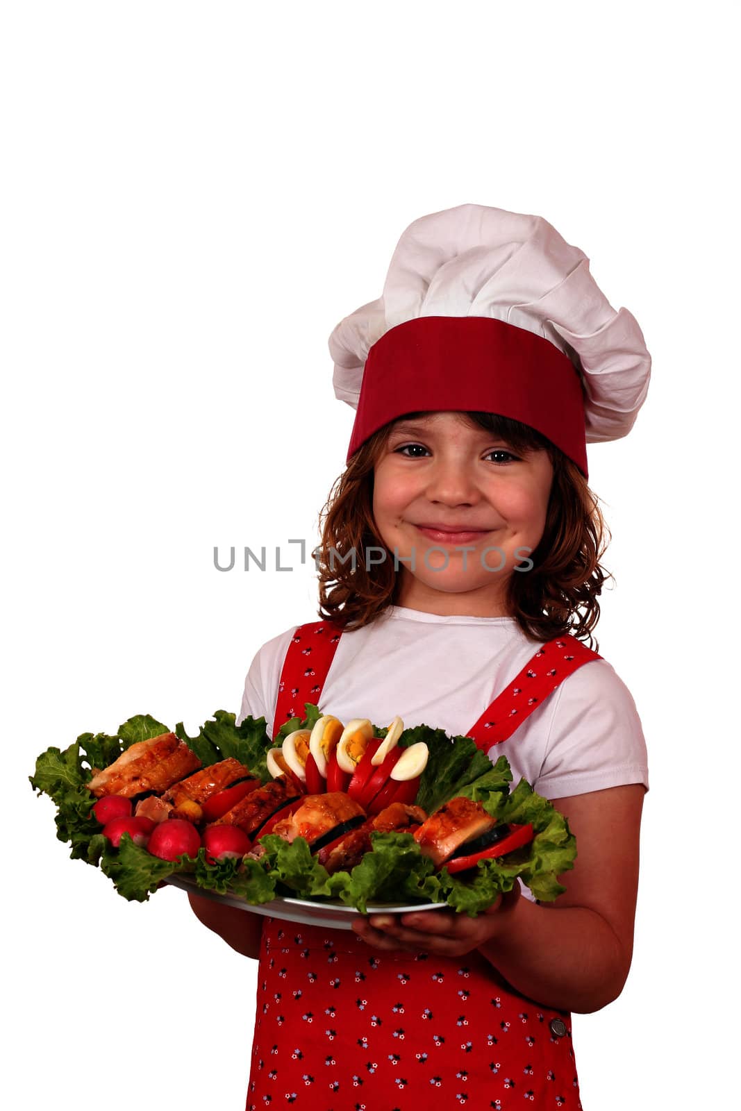 beautiful cheerful little girl cook with gourmet food