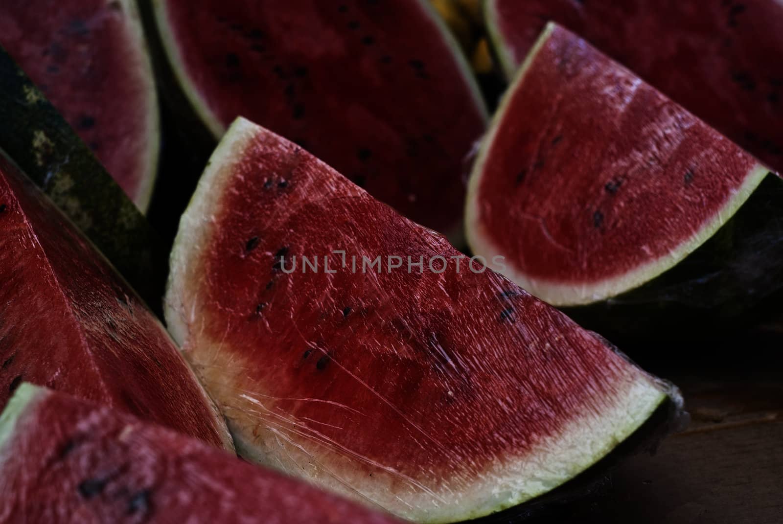 fresh water melon slices for sale at market