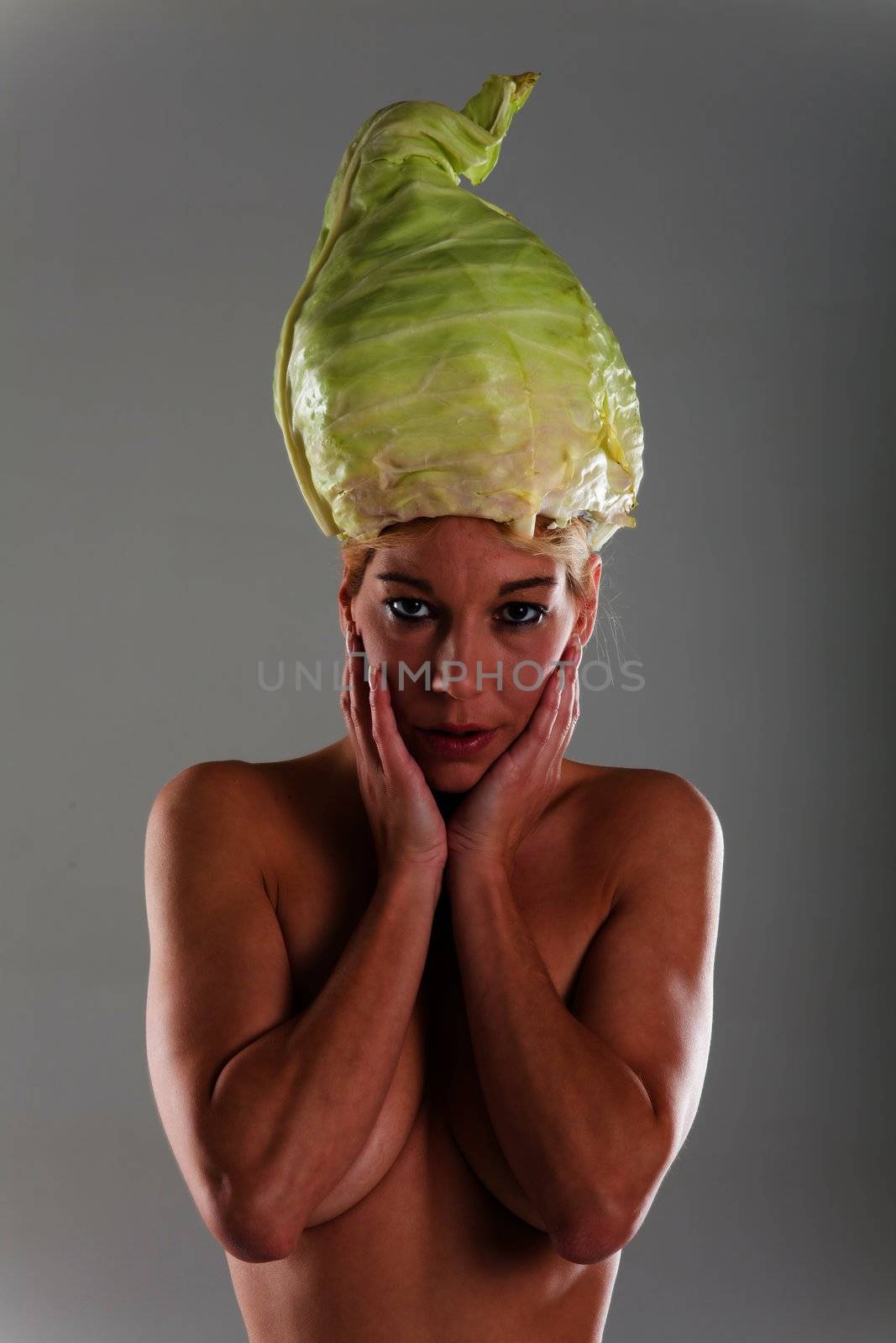 naked woman with pointed cabbage