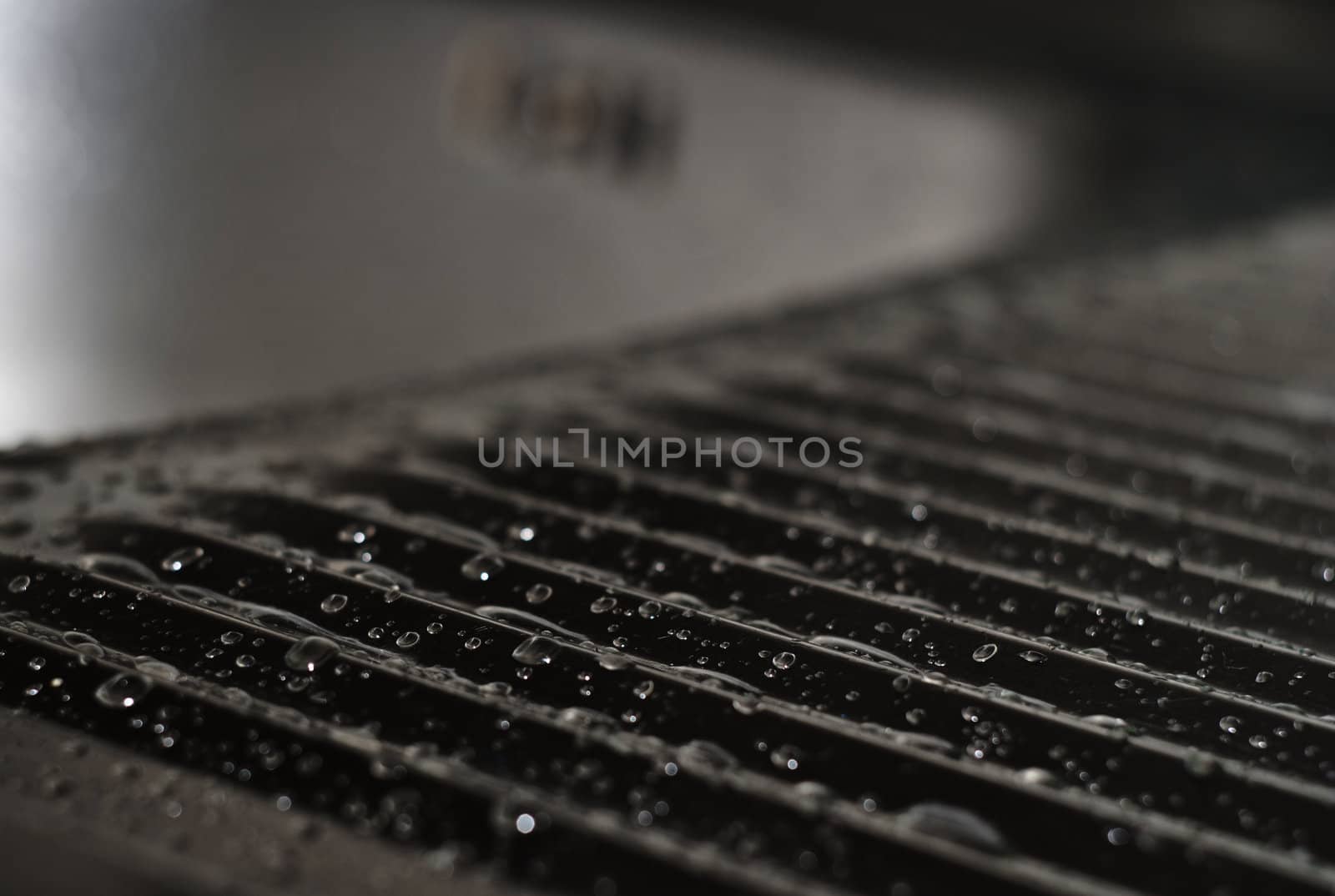 steel kitchen sink with water drops