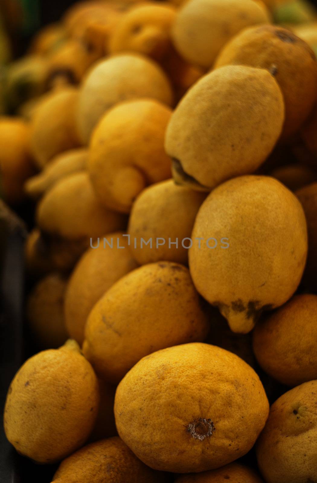 Group of fresh lemons on a market