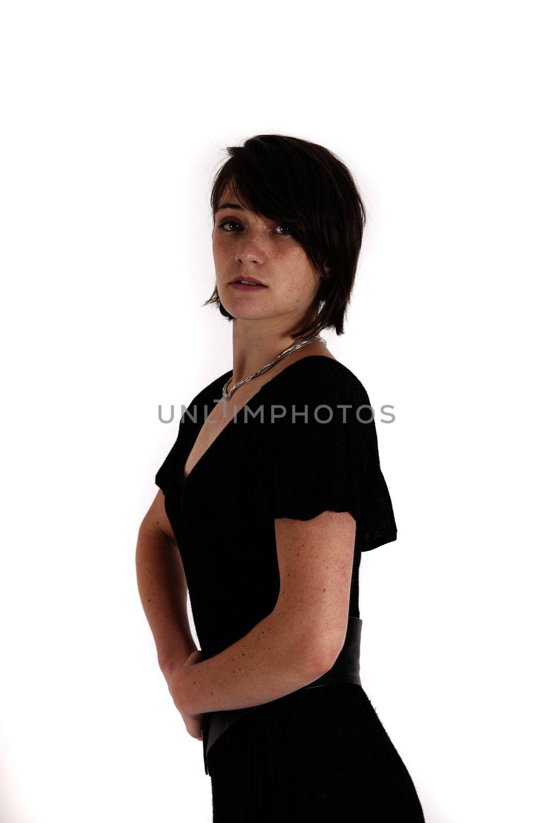 variation of expression on the face of a young brunette woman in studio with a colored scarf