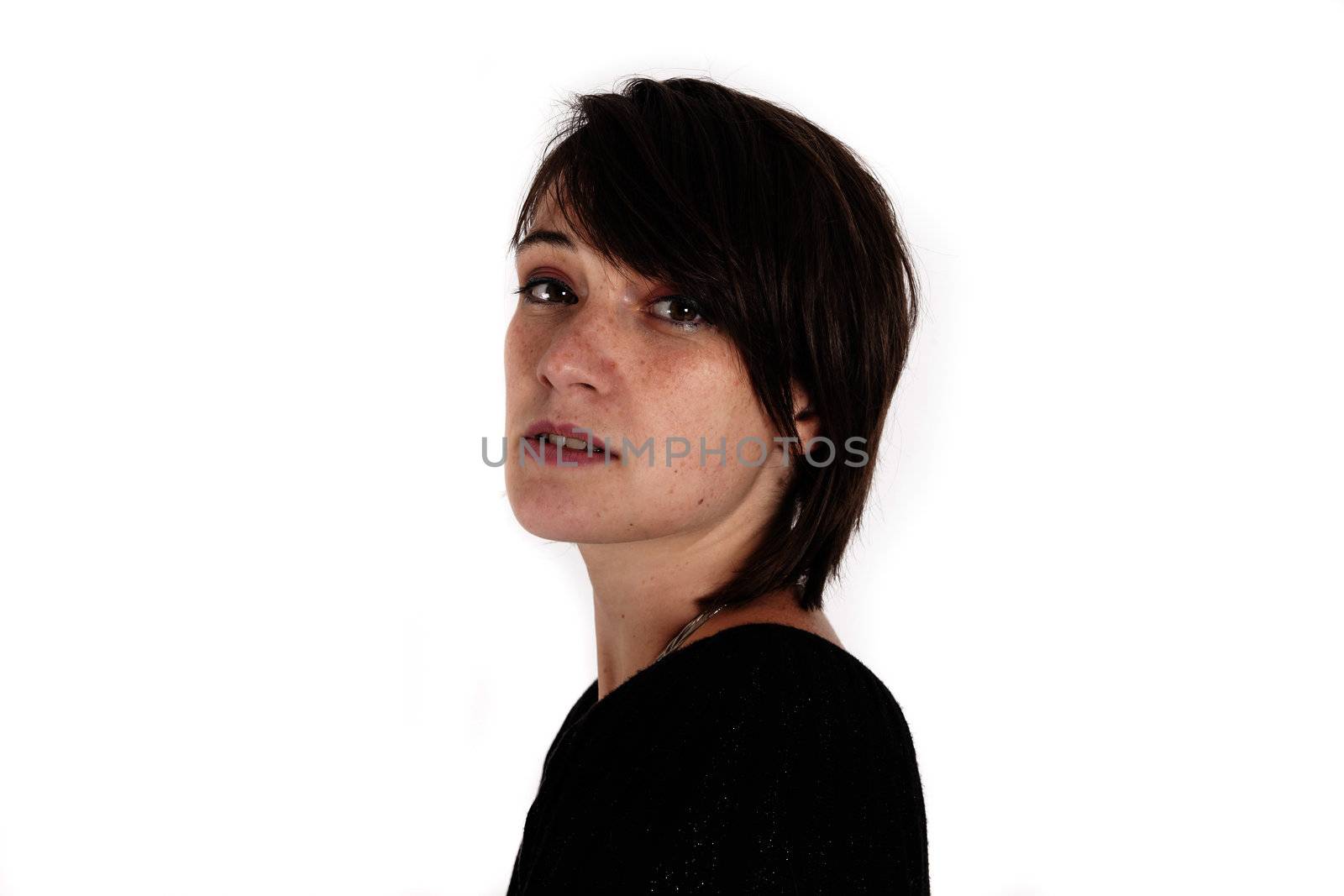 variation of expression on the face of a young brunette woman in studio with a colored scarf