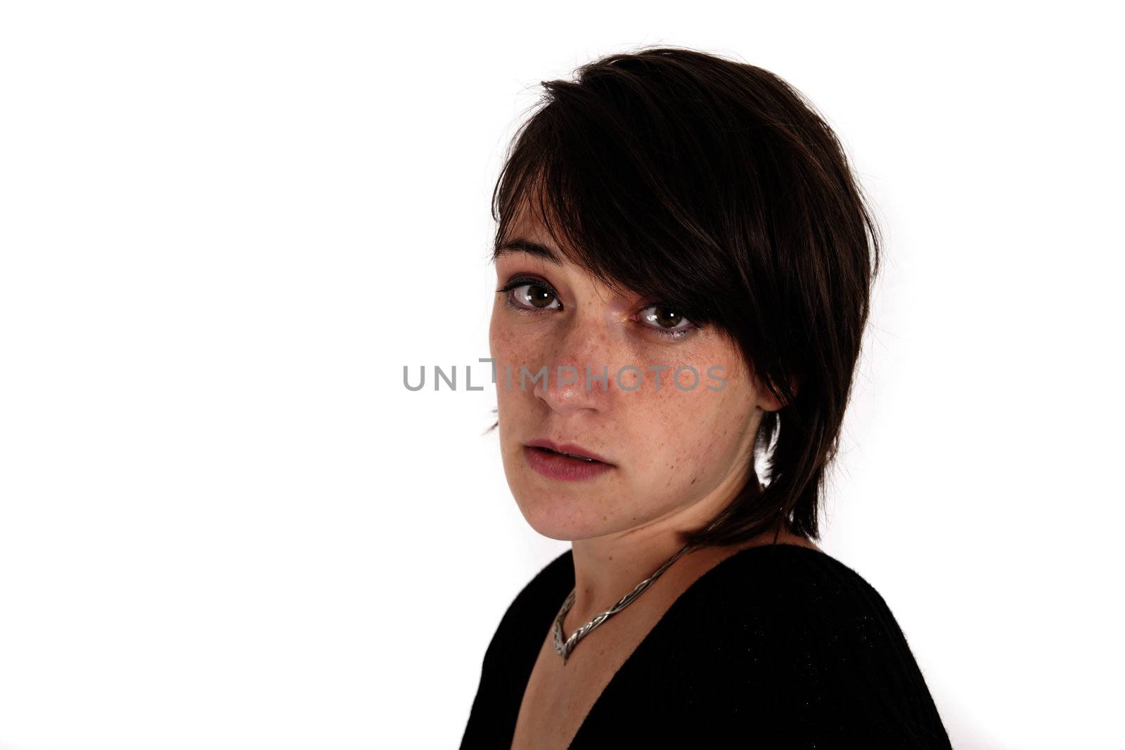 variation of expression on the face of a young brunette woman in studio with a colored scarf