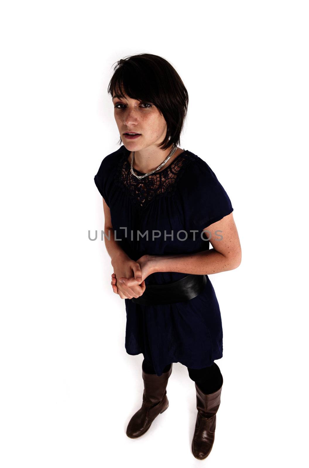 young brunettte woman playing like a model isolated on studio