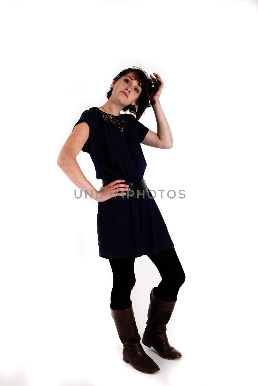 young brunettte woman playing like a model isolated on studio