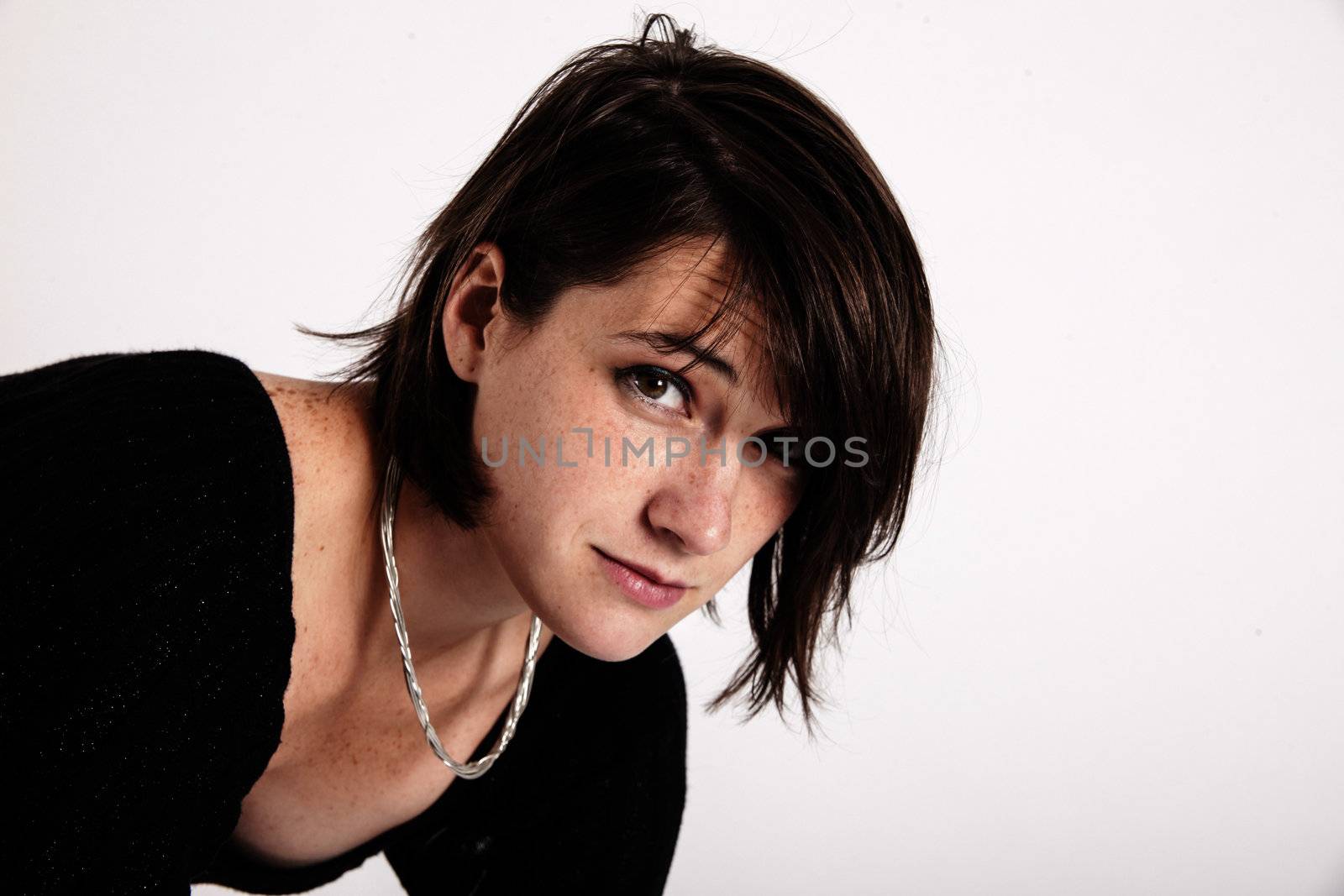 portrait of a brunette on studio by macintox