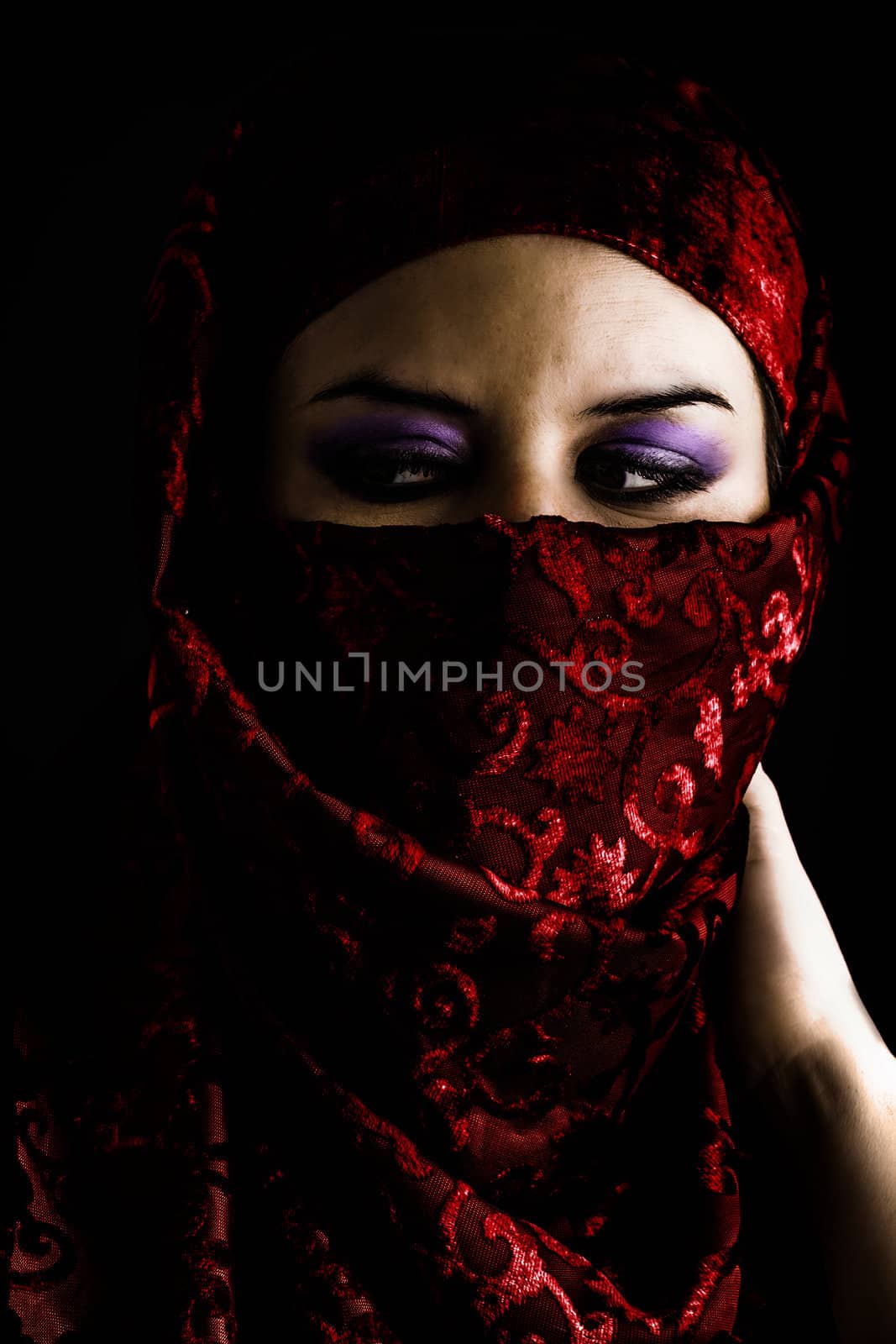 Arab young with traditional red veil, eyes intense, mystical bea by FernandoCortes