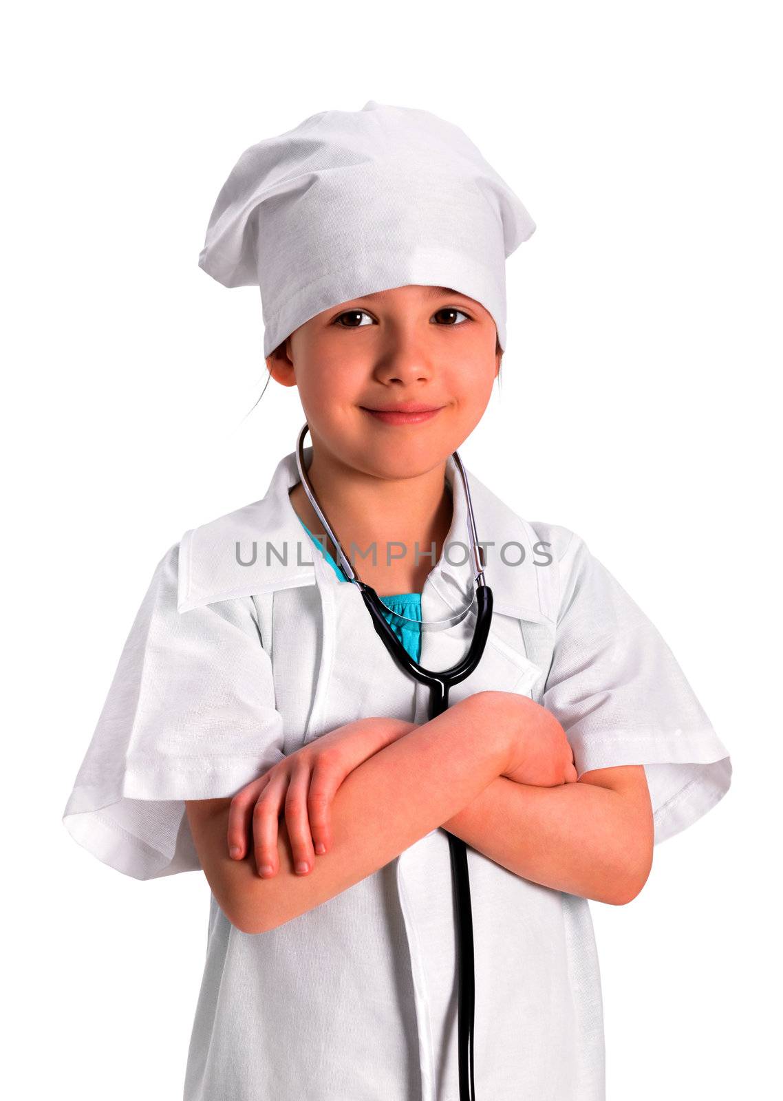 Portrait of a smiling little girl wearing as a nurse on white uniform, with a stethoscope, standing with her arms folded