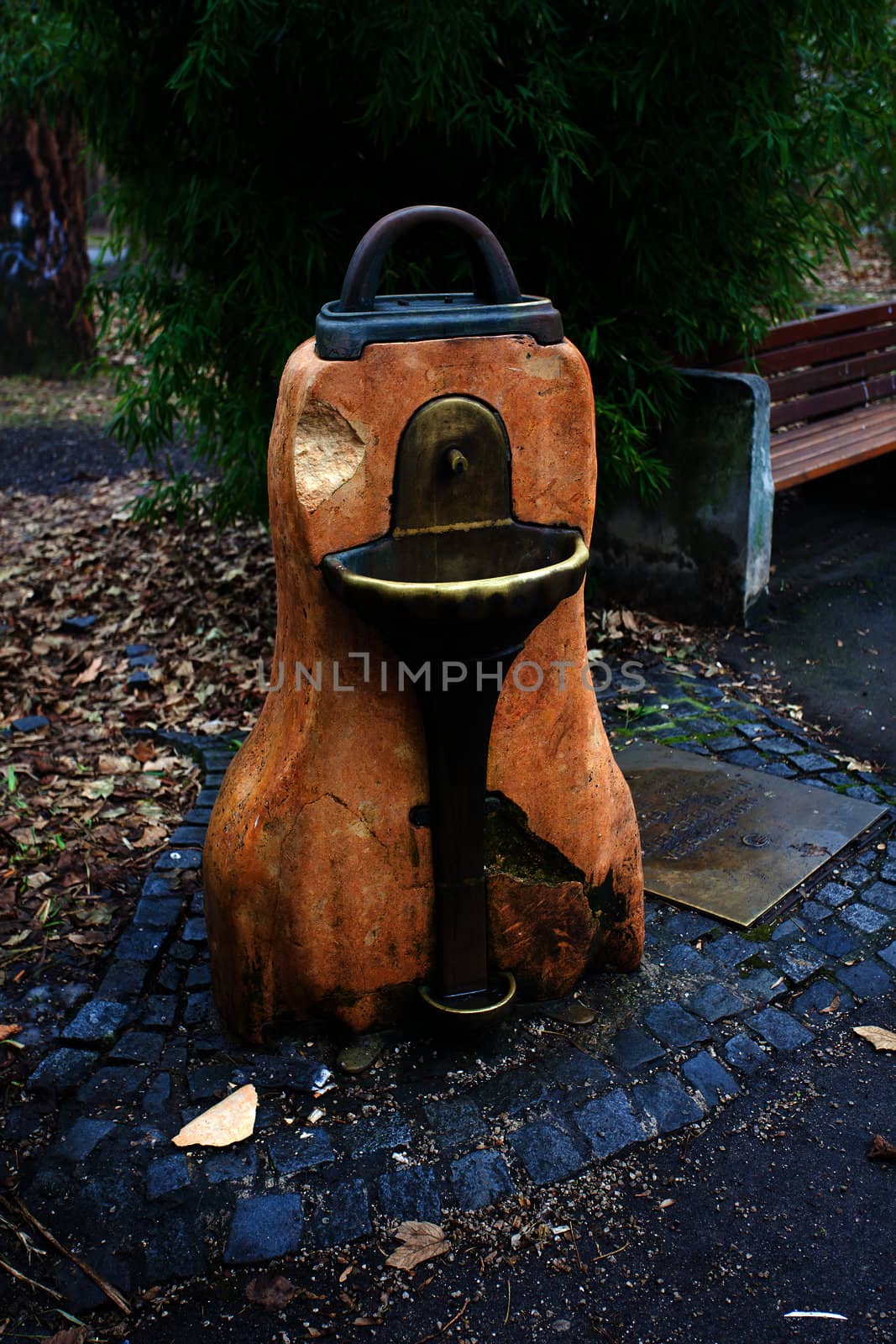 Old water drinking fountain in Vienna, Austria