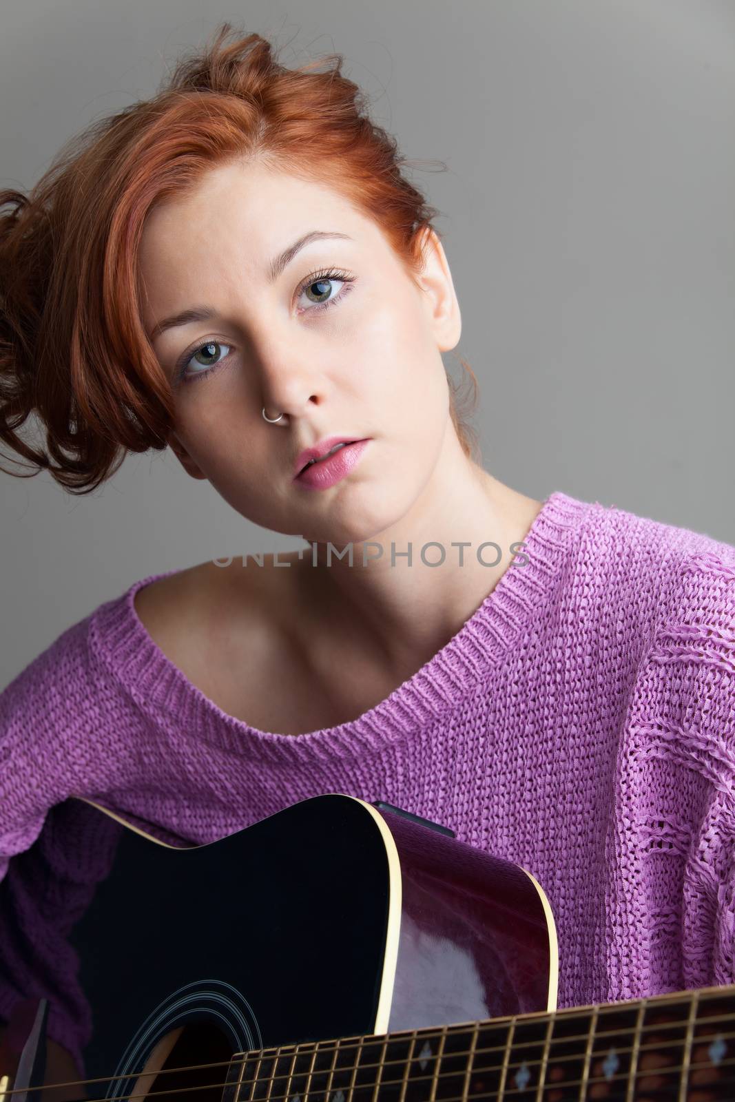 redhead with a guitar by bernjuer