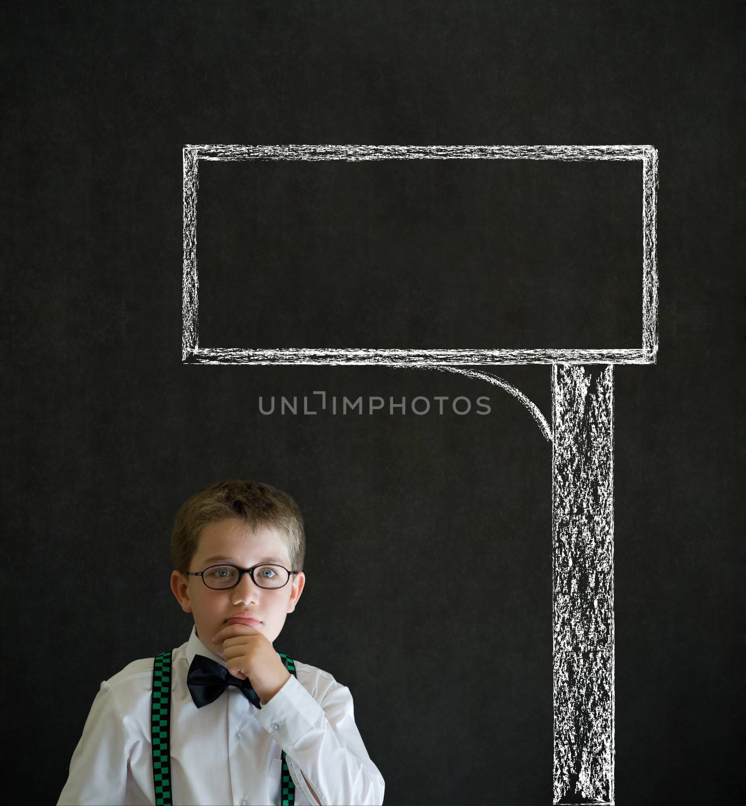 Thinking boy business man with chalk road advertising sign by alistaircotton