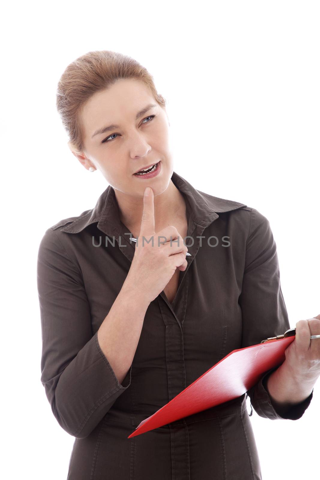 Thinking businesswoman with pen and red folder