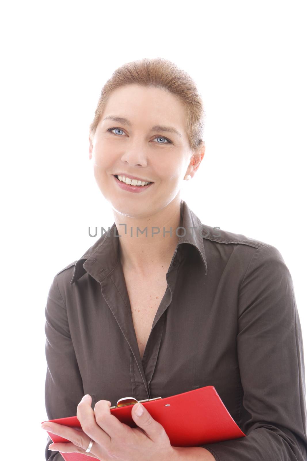 Young businesswoman holding pen and folder in a close up portrait