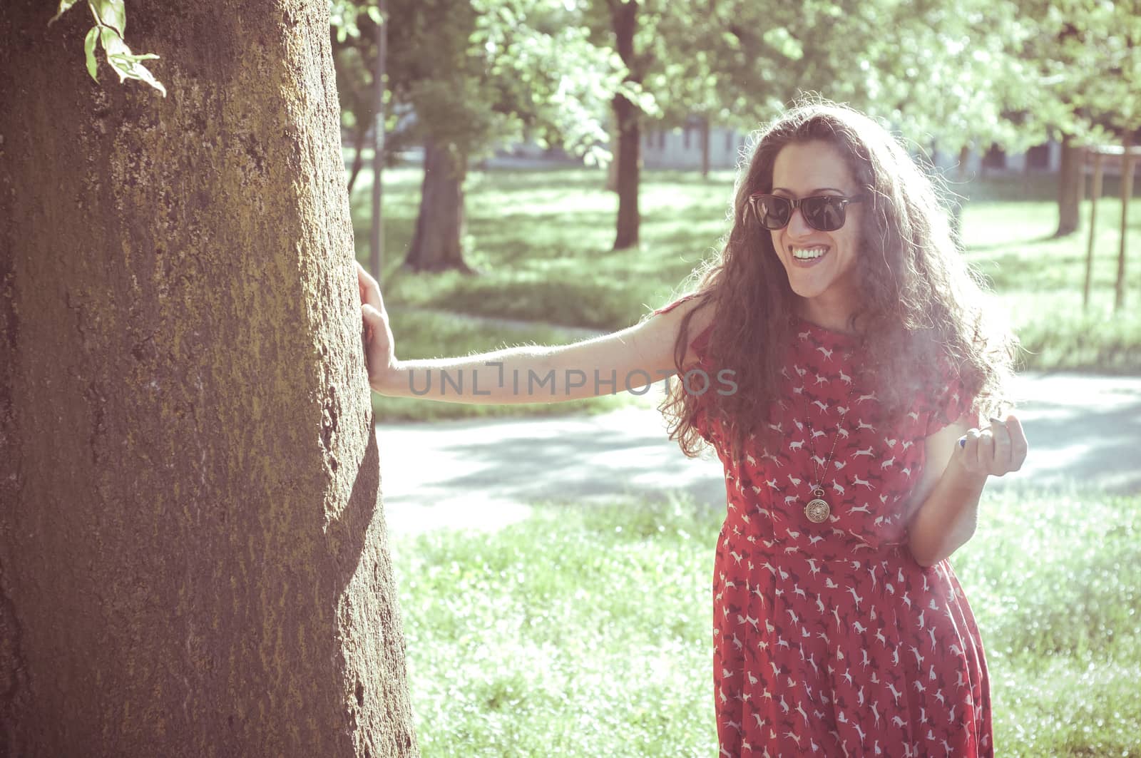 eastern hipster vintage woman with shades at the park