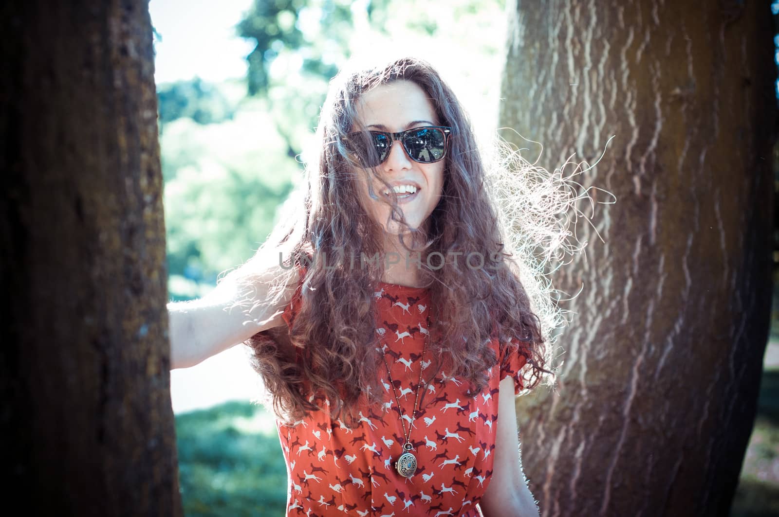 eastern hipster vintage woman with shades at the park