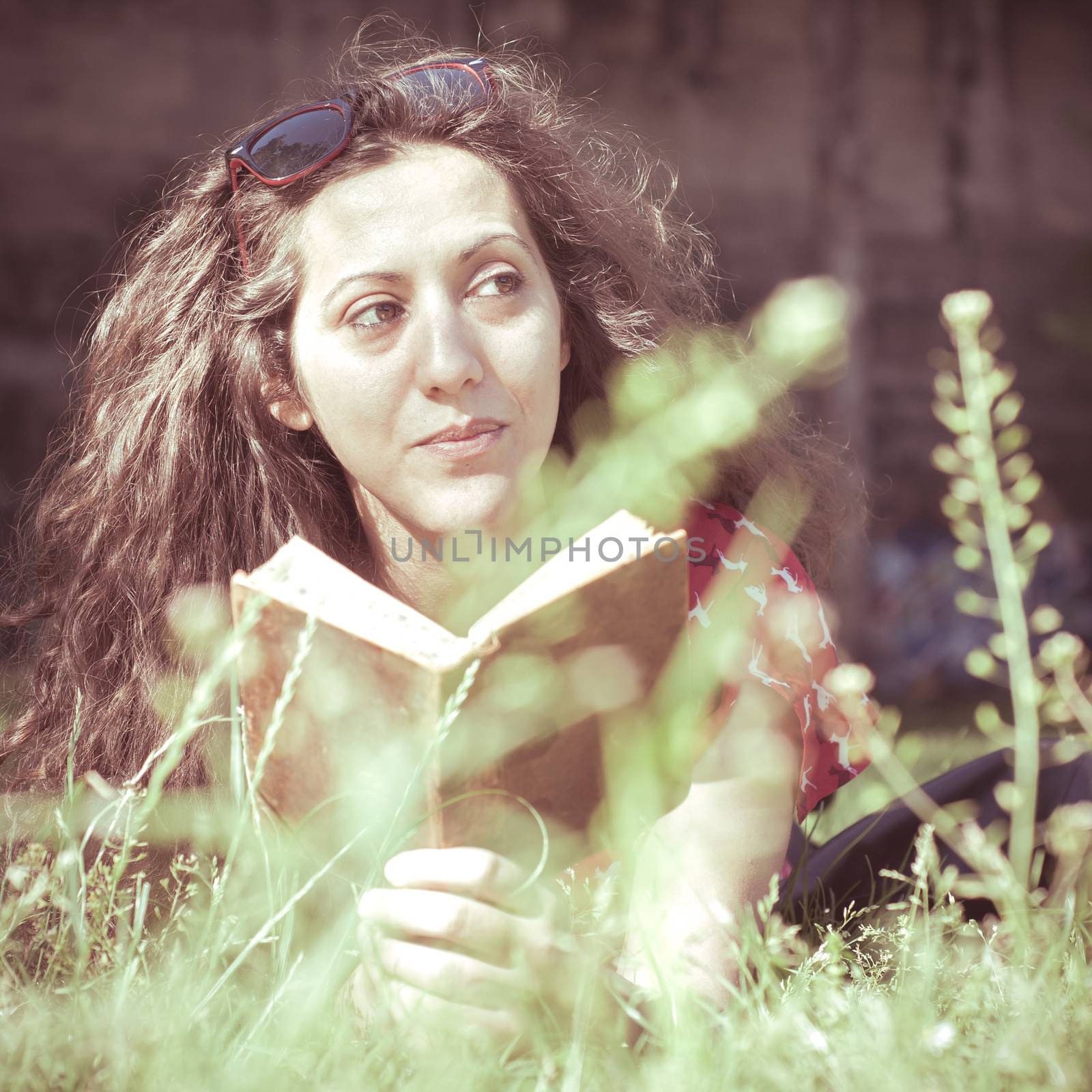 eastern hipster vintage woman reading book by peus