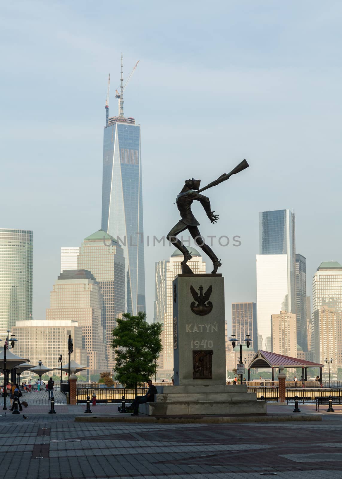 JERSEY CITY, NJ, USA - 22 MAY: Katyn Memorial in Jersey City in front of newly built World Trade Center on 22 May 2013. The statue was unveiled in June 1991