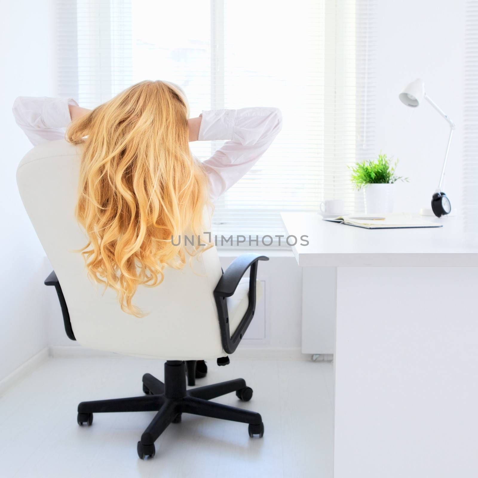 office girl relax and looking at window