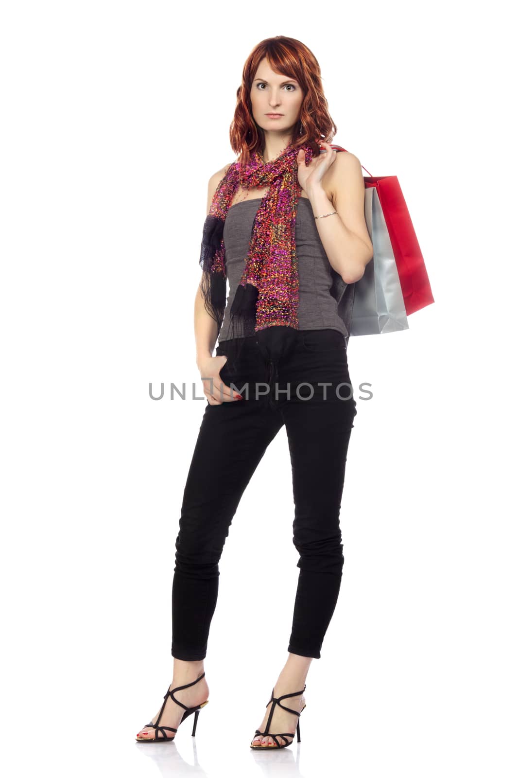 happy girl with shopping bags, isolated on white