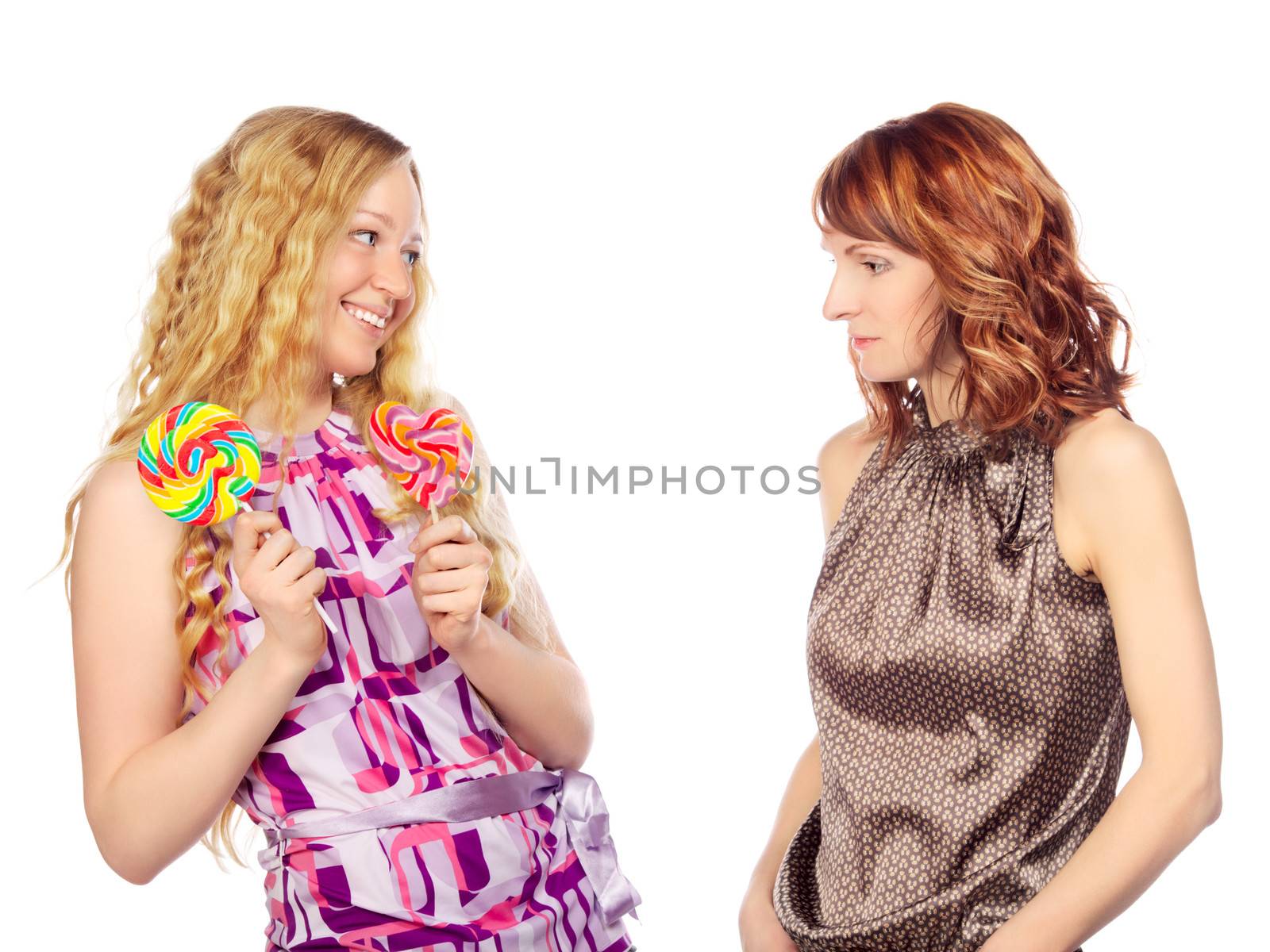 happy girls with lollipops, isolated on white
