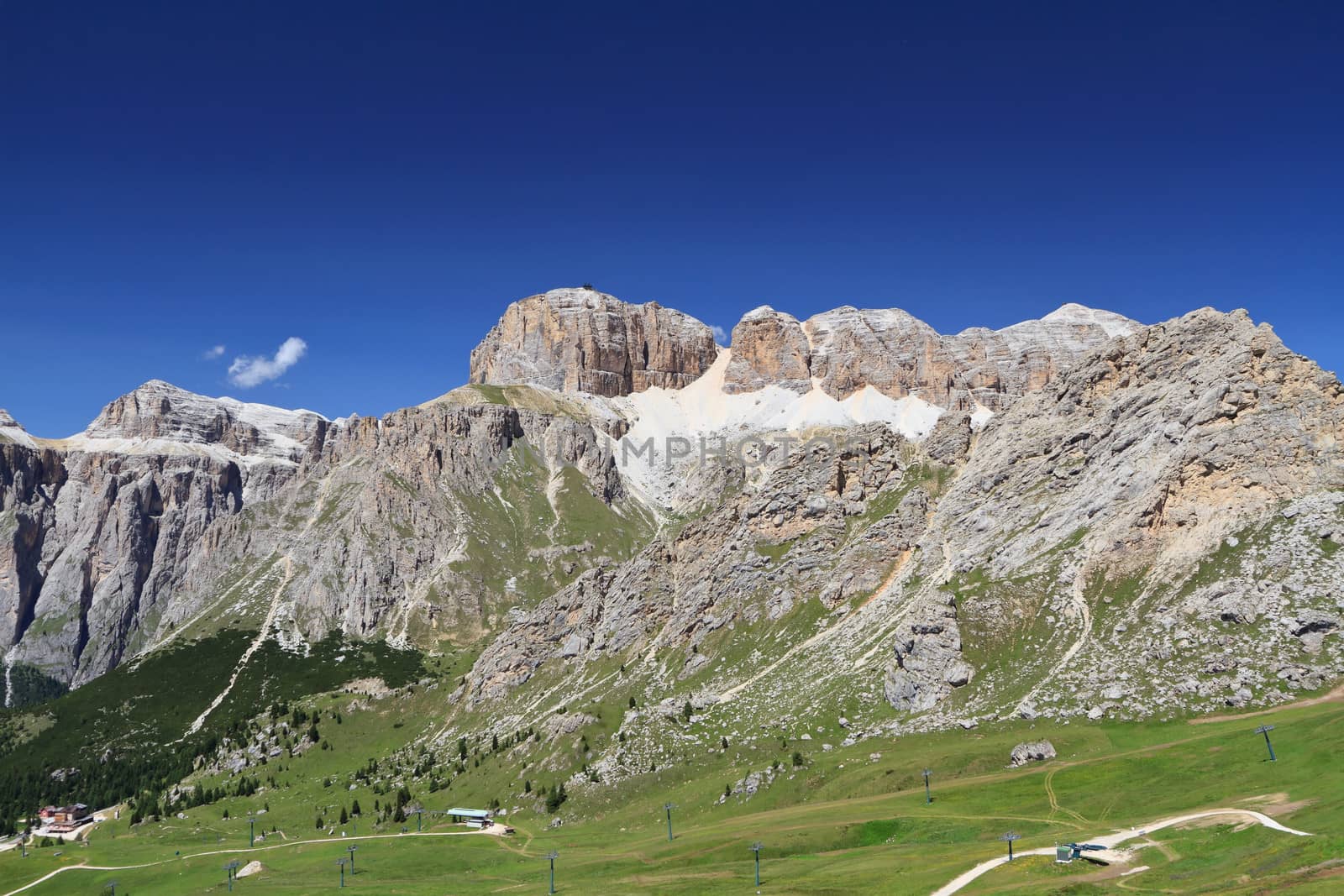 	summer view of Sass Pordoi mount and Fassa Valley, Italian Dolimites 