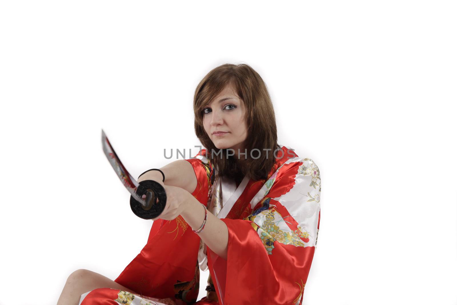 french young girl geisha in red silk kimono with japanese sword