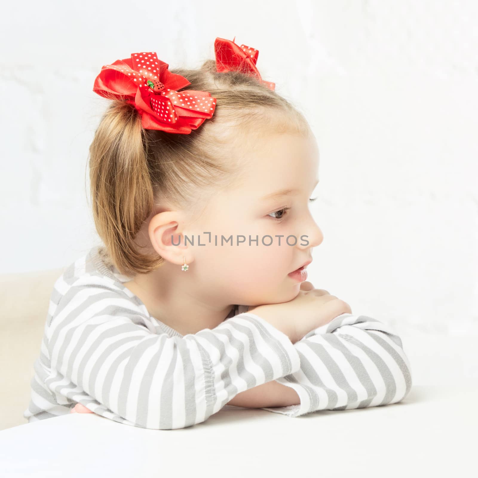 beautiful little girl with red bow-knot, portrait