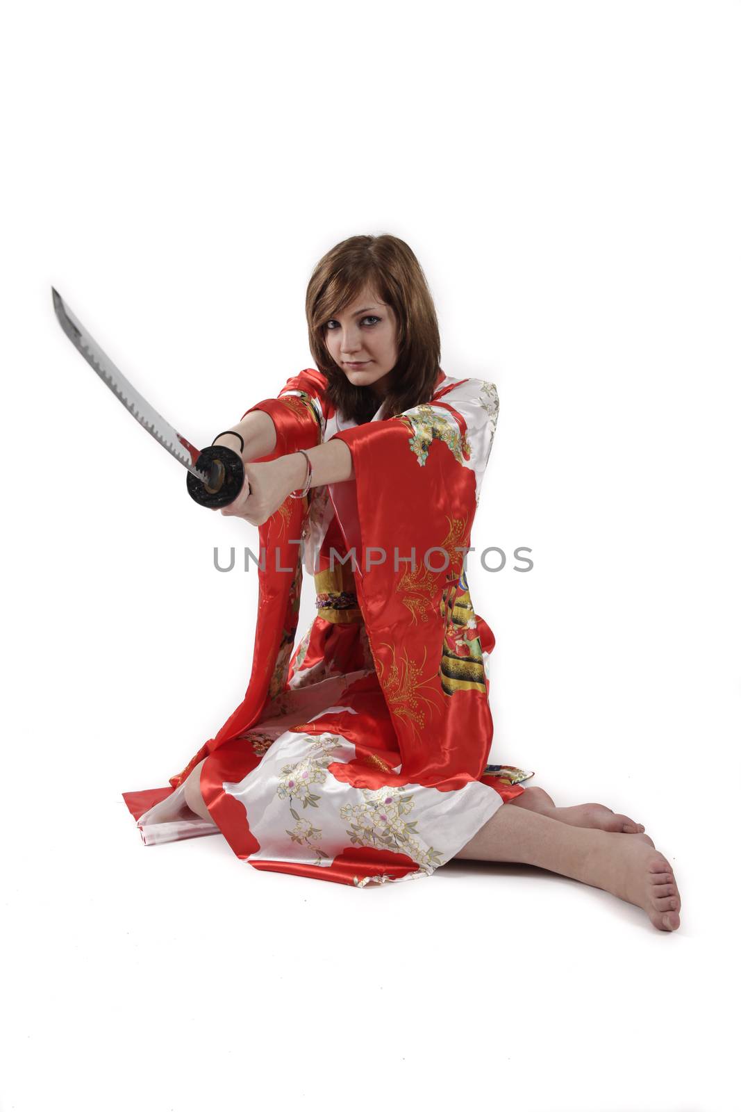 french young girl geisha in red silk kimono with japanese sword