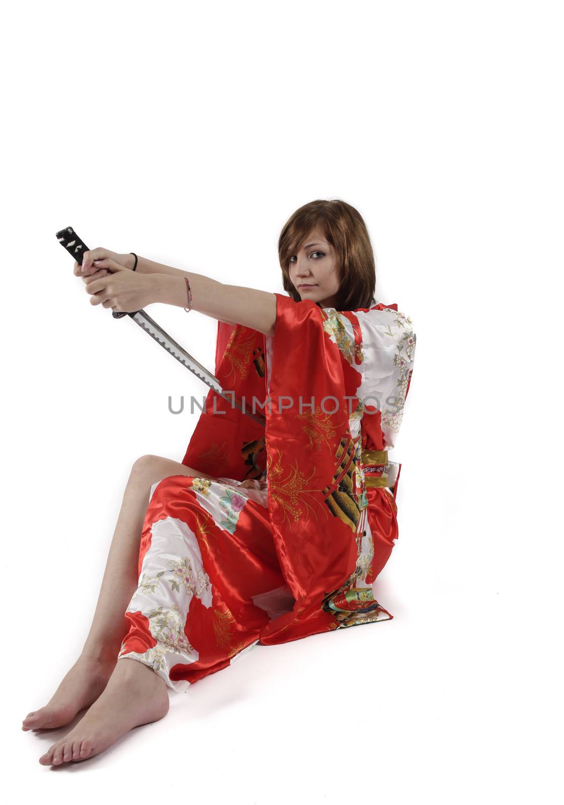 french young girl geisha in red silk kimono with japanese sword