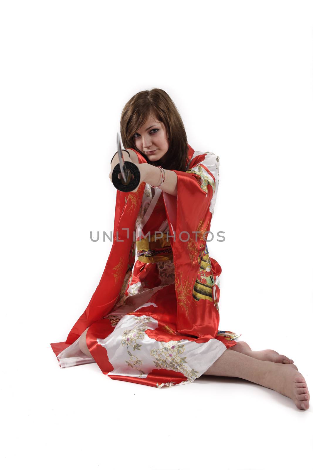 french young girl geisha in red silk kimono with japanese sword