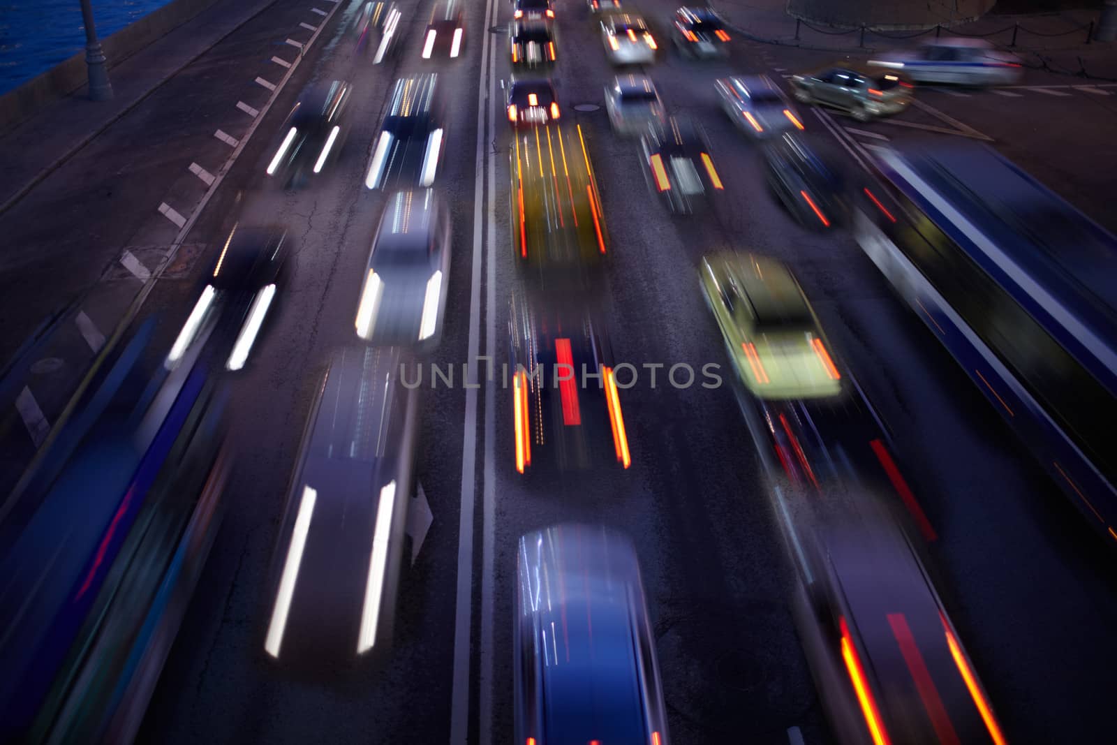 Car traffic at night. Motion blurred background. Long exposure shot.