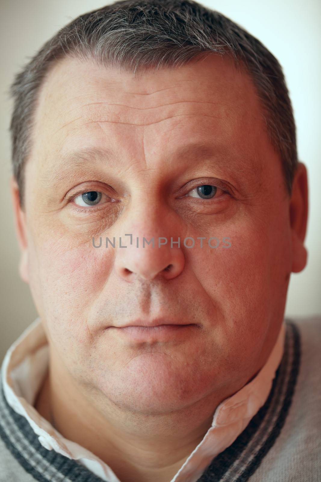 Closeup portrait of senior man. Beautiful shallow dof.