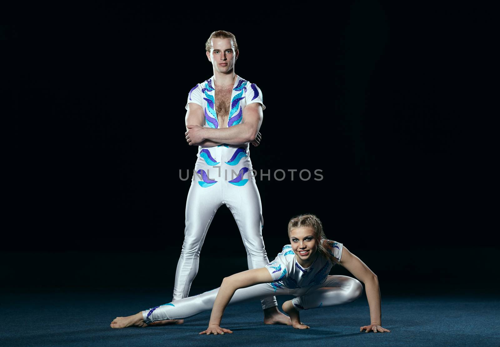 Circus artists perform different tricks.