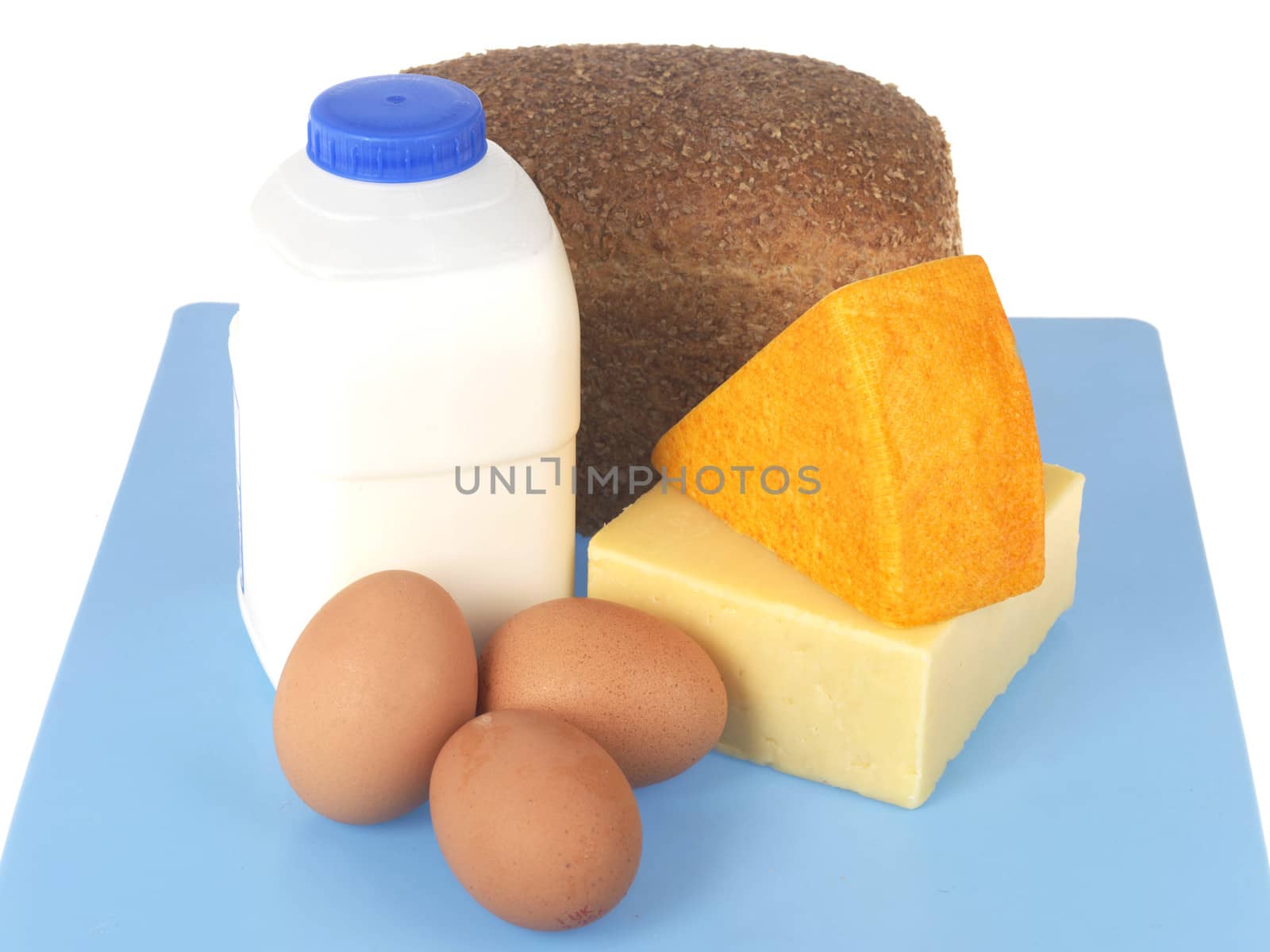 Milk Cheese Eggs and Bread by Whiteboxmedia