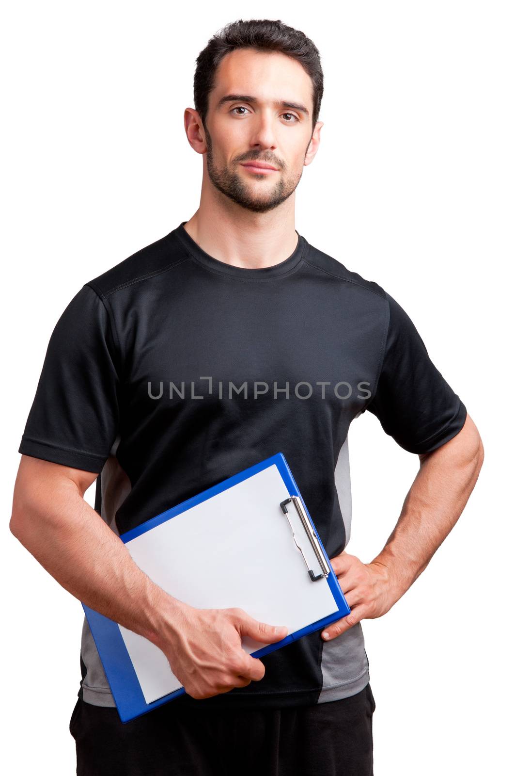 Personal Trainer, with a pad in his hand, isolated in white