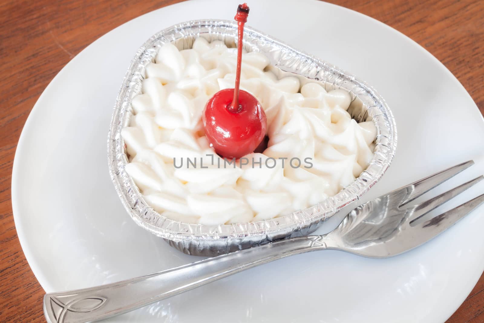 Red velvet cheese cake with cherry topping